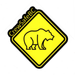 CrewSafe BC's logo. A yellow sign with a bear on it.